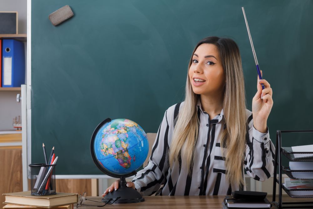 Учитель географии